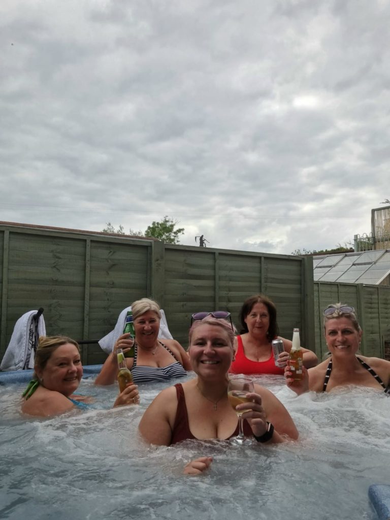 Lorri and the gang celebrating the Scotland win in style in the hot tub